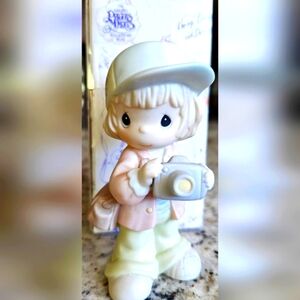 "Focusing In On Those Precious Moments" 1997